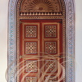 MARRAKECH - Palais de la Bahia : porte en bois peint (zouack) encadrée par une frise continue en gebs 