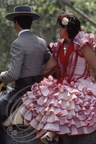 JEREZ de la FRONTERA - la Feria : femme en croupe robe rouge et blanc