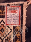 KAIROUAN (Tunisie) - Souk aux tapis : certificat de garantie d'un tapis points noués