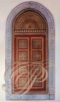 MARRAKECH - Palais de la Bahia : porte en bois peint (zouack) encadrée par une frise continue en gebs 