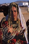 FOUM TATAOUINE (Tunisie) - Festival des ksour : portrait de femme arborant les "rihana" (longues "chaînes du bonheur")