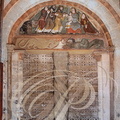 SAILLAC - église Saint-Jean-Baptiste : portail à tympan polychrome et trumeau torsadé