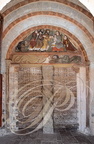 SAILLAC - église Saint-Jean-Baptiste : portail à tympan polychrome et trumeau torsadé