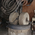 Distillerie DENOIX à Brive-la-Gaillarde (19) -  meules servant à écraser les noix