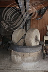 Distillerie DENOIX à Brive-la-Gaillarde (19) -  meules servant à écraser les noix
