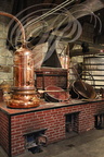 Distillerie DENOIX à Brive-la-Gaillarde (19) -  l'alambic et le four à charbon