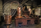 Distillerie DENOIX à Brive-la-Gaillarde (19) -  l'alambic, le four à charbon et les cuves