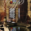 Distillerie DENOIX à Brive-la-Gaillarde (19) - reflet du vitrail dans la cuve au serpentin 