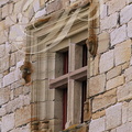 CUREMONTE - château de la Johannie : fenêtre à meneaux