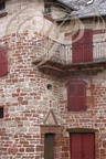 MEYSSAC - maison du XVIIe siècle : balcon en encorbellement du XIXe siècle