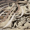 BEAULIEU-SUR-DORDOGNE - église Saint-Pierre : le portail méridional (le tympan roman : détail de la partie inférieure représentant l'enfer et des animaux fantastiques)