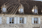 BEAULIEU-SUR-DORDOGNE - place Marbot (anciennement place de la barbacane) : maison du Bessol (XVIIe siècle)  lucarnes de style Louis XIII - héberge actuellement l'Office du Tourisme