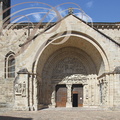 BEAULIEU-SUR-DORDOGNE - église Saint-Pierre : le portail méridional  (le porche roman)