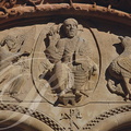 MORLAÀS - église Sainte-Foy : le tympan roman (détail le Christ en majesté entouré d'un ange présentant l'Évangile de Matthieu et d'un aigle symbolisant l'apôtre Jean)