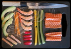 Ingrédients prêts pour la fabrication des SUSHIS (avocat, carotte, foie gras, crevettes, radis, mangue, concombre, saumon) par Hélène Reberga ("BAGUETTE ET SUSHI") 