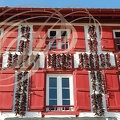 ESPELETTE - façade décorée de piments (hôtel Euzkadi) detail